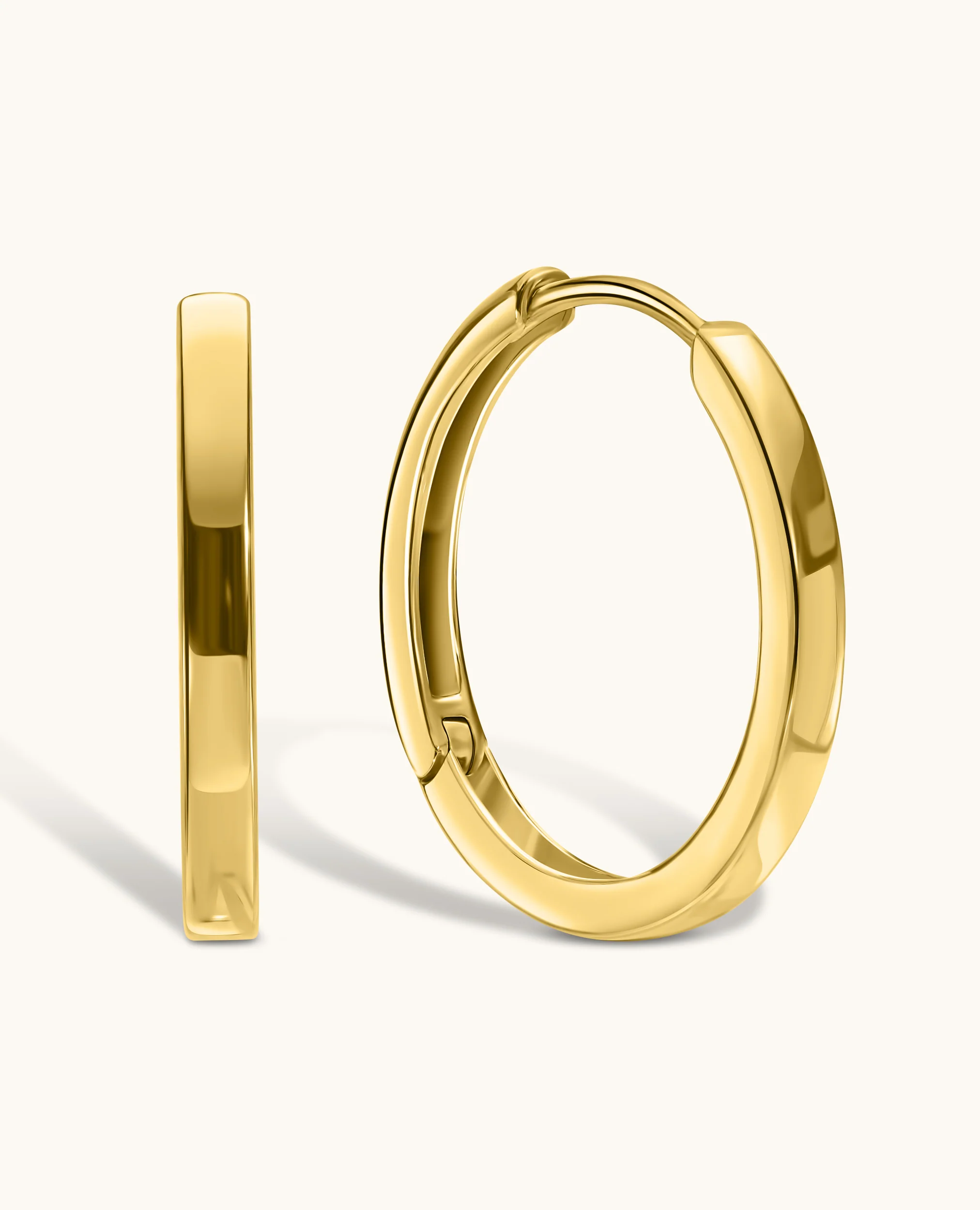 Gold Huggie Earrings - Image 3