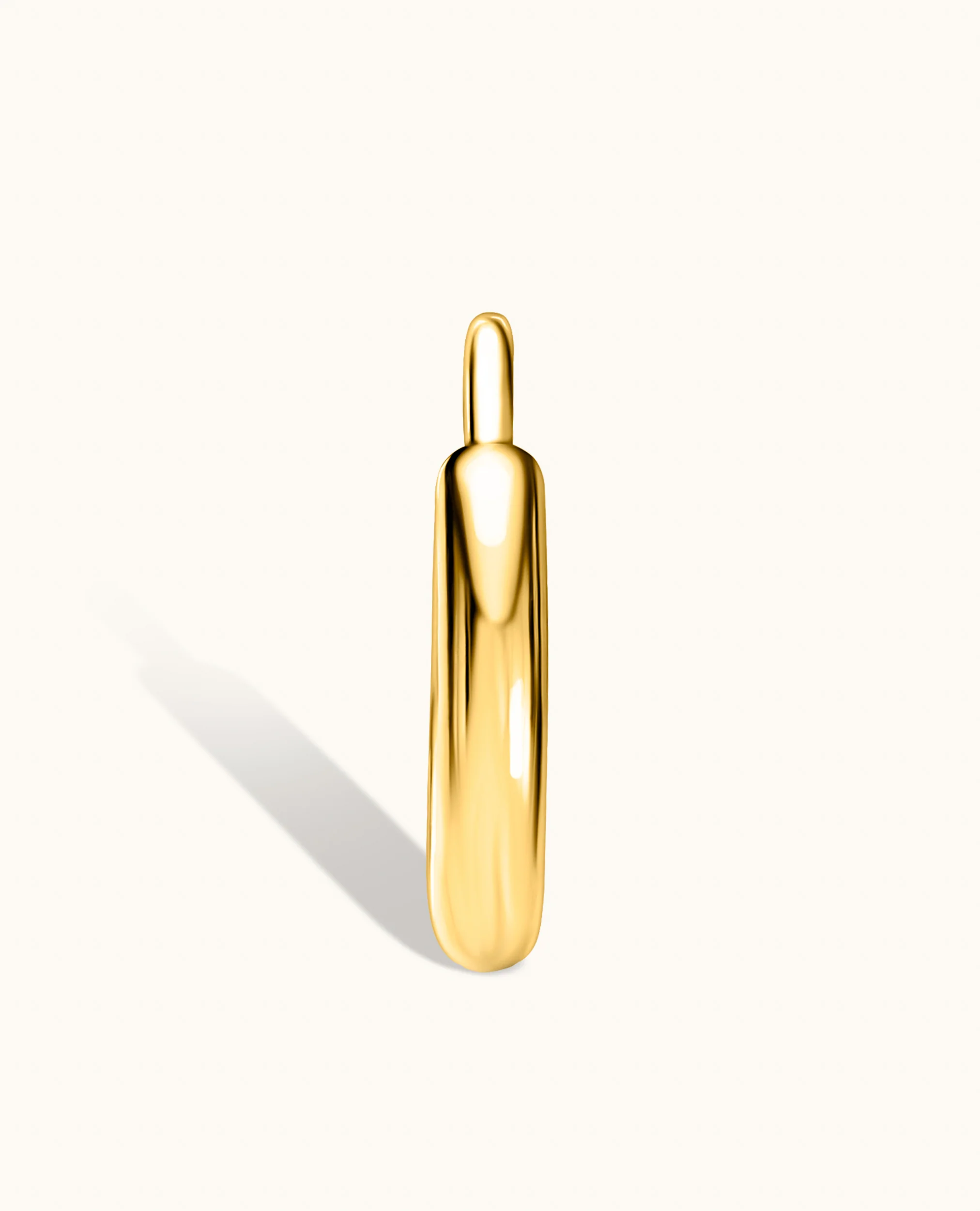 Gold Huggie Earrings - Image 6