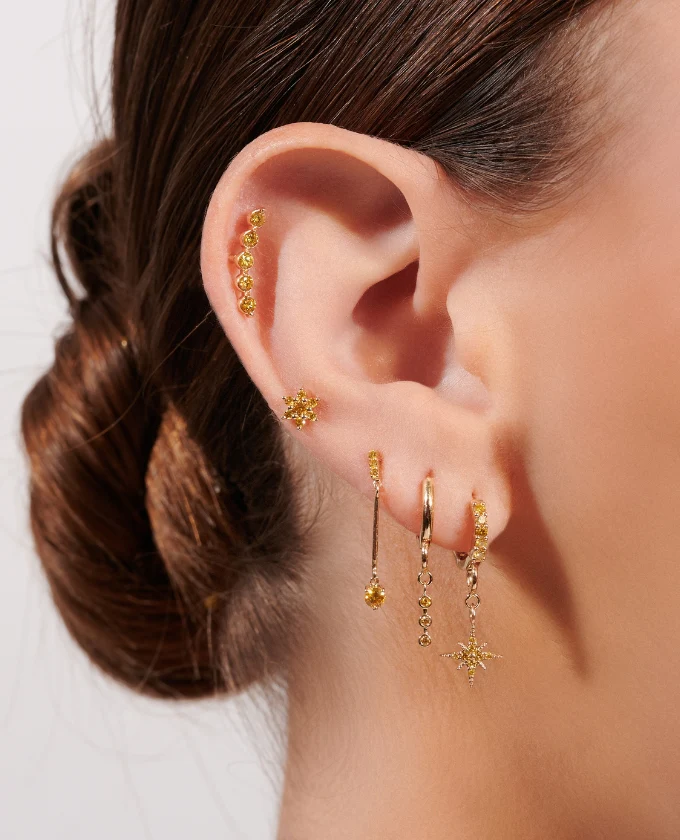 Gold Huggie Earrings - Image 4