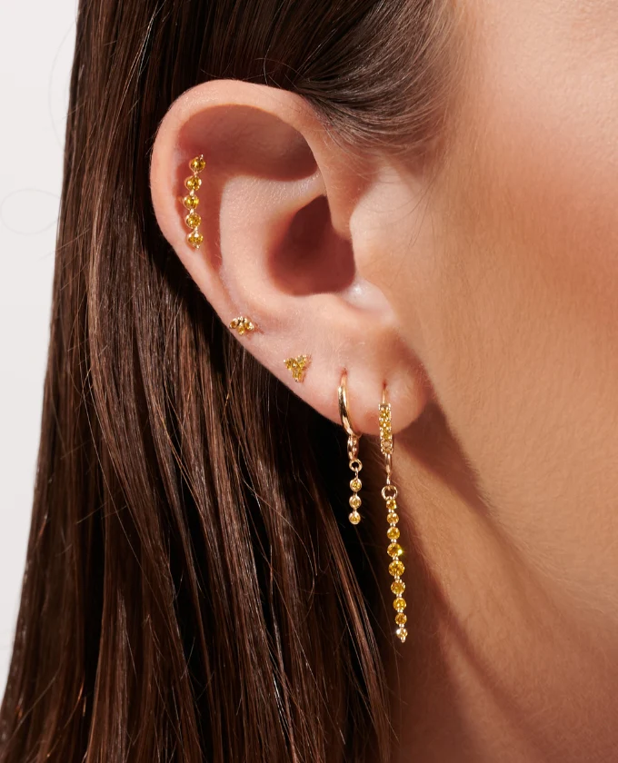 Gold Huggie Earrings - Image 8